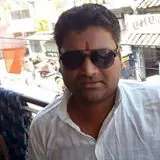 A photograph of Sanjeet Kumar, looking awesome in his shades, a happy customer. 