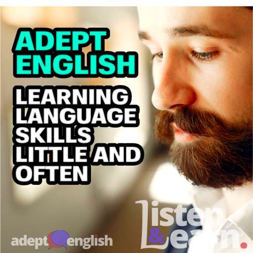 A photograph of a man wearing headphones as he listens to Adept English, learning to speak English.