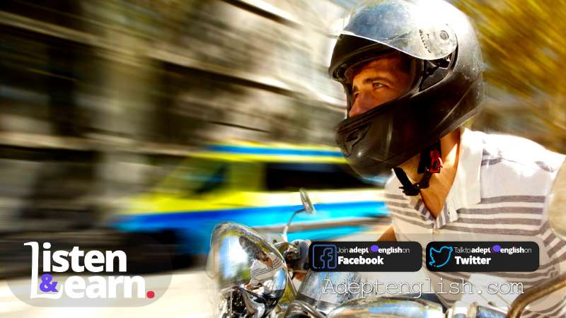 A photograph of a man riding a scooter at speed on the road with blurred background. Learn how to set your own speed using our English lessons.