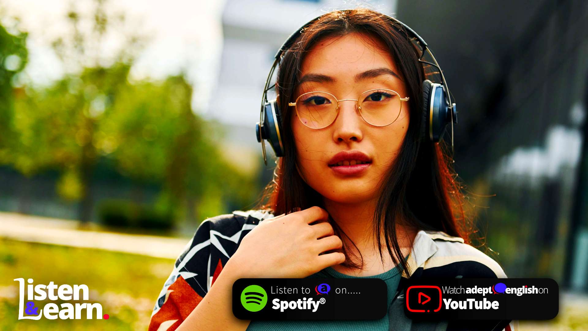 A photo of a young woman listening to English podcasts. Improve your spoken English fluency today! Listen and speak with our English listening practice lesson! #LearnEnglish #FluentEnglish