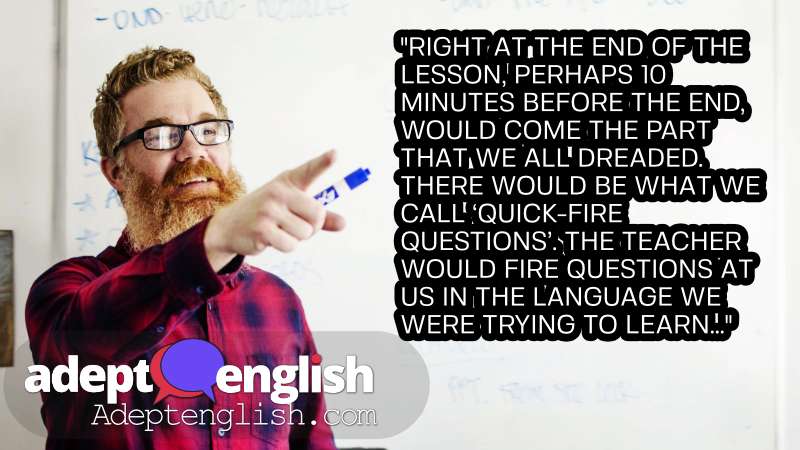 A photograph of a teacher at a white board. We teach you English with podcasts helping you learn to understand and speak it by listening to real conversations you care about