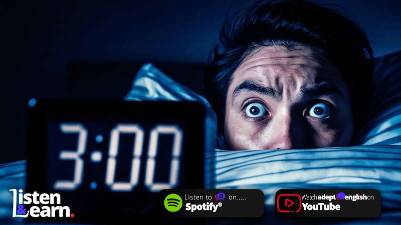 A wide eyed man stares at a digital alarm clock which says 3am. Boost your brain health through listening.