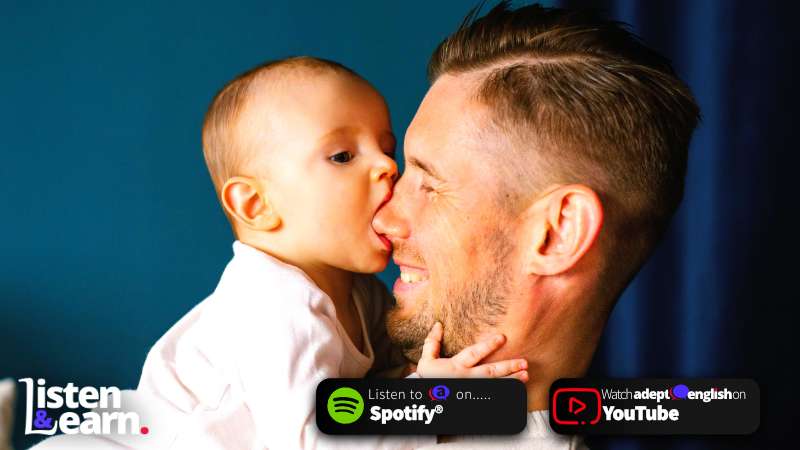 A man holding a baby close to his nose. Elevate your listening skills & join our global community! Subscribe now!