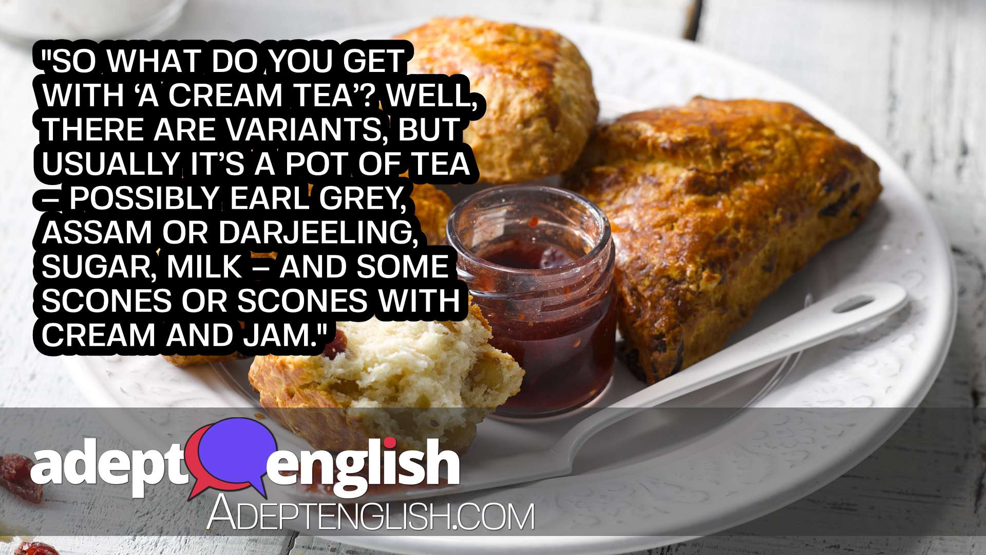 A photograph of a cranberry scone with some nice jam used to help explain the British obsession with tea and the vocabulary around this topic.