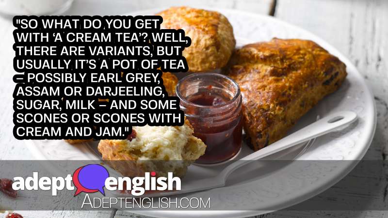 A photograph of a cranberry scone with some nice jam used to help explain the British obsession with tea and the vocabulary around this topic.