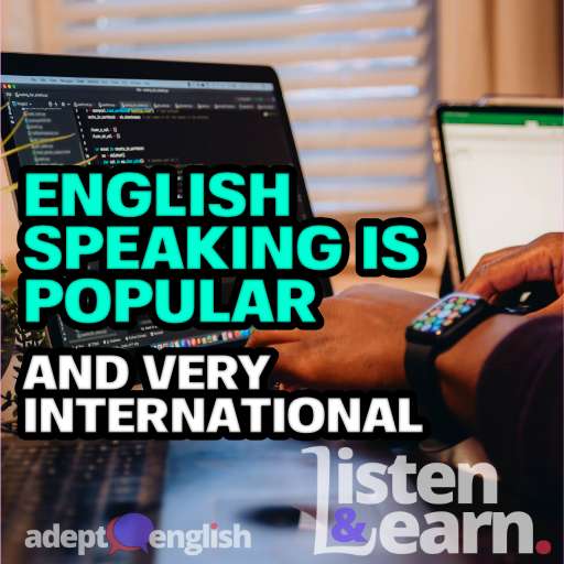 A photograph of an African American man sitting in front of computer coding, programming, web developer. Nearly all programmers are in part, English speakers.
