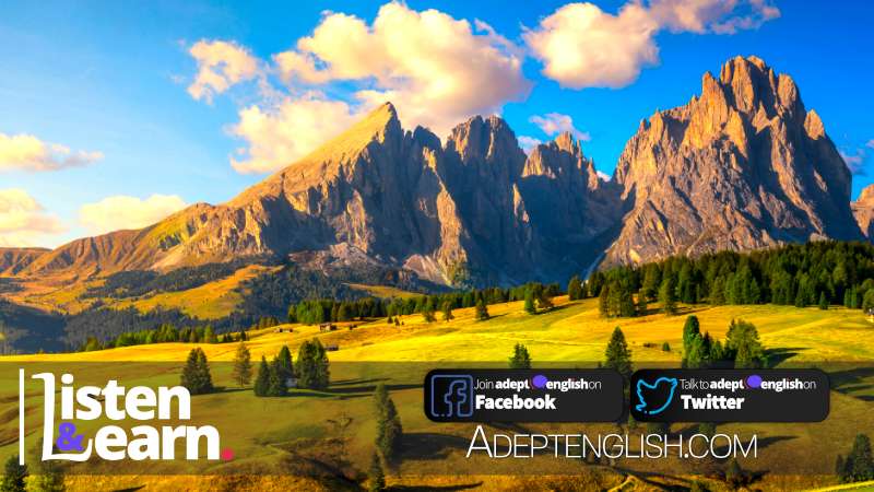 A photograph of the Alpe di Siusi or Seiser Alm and mountains, Dolomites Alps, Italy. English irregular verbs in today's English lesson.